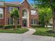 Elegant brick home with a stately front facade, manicured landscaping, and a welcoming entrance at 13029 Whisper Creek Dr, Charlotte, NC 28277