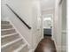 Hallway view featuring stairs and a view to a modern bathroom at 13029 Whisper Creek Dr, Charlotte, NC 28277