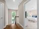 Upstairs hallway featuring a staircase and an open doorway to the bedroom at 13029 Whisper Creek Dr, Charlotte, NC 28277