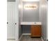 Bathroom with a single vanity, wood cabinets, and integrated countertop at 131 Scotland Dr, Mooresville, NC 28115