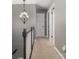 Upstairs hallway featuring carpet, white trim, and neutral walls at 131 Scotland Dr, Mooresville, NC 28115