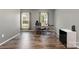 Bright office space featuring hardwood floors, neutral walls, and natural light from the windows at 131 Scotland Dr, Mooresville, NC 28115