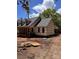 New home under construction featuring a brick foundation and covered front porch at 1473 Tom Joye Rd, Clover, SC 29710