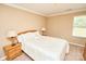 Bedroom featuring neutral walls and carpet, as well as a comfortable bed and nightstands at 14837 Dungannon Ct, Charlotte, NC 28278