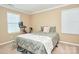 A cozy bedroom with neutral walls and natural light offers a comfortable and relaxing atmosphere at 14837 Dungannon Ct, Charlotte, NC 28278