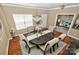 Elegant dining room featuring a chandelier, stylish furnishings, and plenty of natural light at 14837 Dungannon Ct, Charlotte, NC 28278