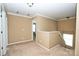 Bright hallway featuring neutral walls and carpet, leading to other rooms in the home at 14837 Dungannon Ct, Charlotte, NC 28278