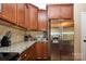 Well-appointed kitchen featuring stainless steel appliances and ample cabinet space at 14837 Dungannon Ct, Charlotte, NC 28278