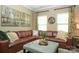 Spacious living room with a comfortable sectional sofa and tasteful decor at 14837 Dungannon Ct, Charlotte, NC 28278