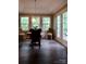 Bright breakfast nook with ample natural light and a view to the backyard and mature trees at 1657 6Th Se St, Hickory, NC 28602