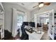 Functional home office featuring hardwood floors, natural light, and views of the living room at 1713 Allen St, Charlotte, NC 28205