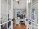 Bright home office space with hardwood floors, natural light, and modern desk setup at 1713 Allen St, Charlotte, NC 28205