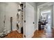Convenient laundry room features a stacked washer and dryer with wood floors at 1713 Allen St, Charlotte, NC 28205