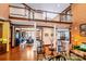 Spacious living area with open floor plan, soaring ceilings, and hardwood flooring at 1720 Mills Harris Rd, Wingate, NC 28174