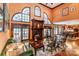Bright living room with a fireplace, french doors, and hardwood flooring at 1720 Mills Harris Rd, Wingate, NC 28174