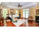 Spacious bedroom with fireplace, natural light and trey ceilings at 1720 Mills Harris Rd, Wingate, NC 28174