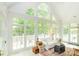 Bright sunroom with many windows and natural light at 1720 Mills Harris Rd, Wingate, NC 28174