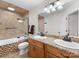 Bathroom with tile, bathtub, shower and double sink vanity at 17501 Youngblood Rd, Charlotte, NC 28278