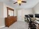 Bedroom with neutral walls, carpet, dresser and multiple computer stations at 17501 Youngblood Rd, Charlotte, NC 28278