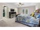 Comfortable bedroom with closet, ensuite access, and doors to deck at 17501 Youngblood Rd, Charlotte, NC 28278