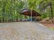 A large carport is perfect for storing vehicles or boats and equipment at 17501 Youngblood Rd, Charlotte, NC 28278