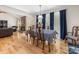 Bright dining room features natural light and wood flooring at 17501 Youngblood Rd, Charlotte, NC 28278