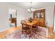 Charming dining area with wooden table and china cabinet at 17501 Youngblood Rd, Charlotte, NC 28278