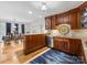 Modern kitchen with custom wood cabinetry and ample counter space at 17501 Youngblood Rd, Charlotte, NC 28278