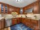 Gourmet kitchen featuring stainless steel appliances and custom cabinetry at 17501 Youngblood Rd, Charlotte, NC 28278