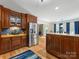 Well-equipped kitchen featuring wood cabinets, island and stainless steel appliances at 17501 Youngblood Rd, Charlotte, NC 28278