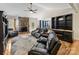 Cozy living room featuring a stone fireplace and vaulted ceiling at 17501 Youngblood Rd, Charlotte, NC 28278