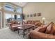 Spacious living room with plenty of seating and natural light from large windows at 18669 Vineyard Point Ln, Cornelius, NC 28031