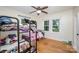 bedroom with hardwood floors, bright windows and bunk beds at 200 Cleveland Ave, Shelby, NC 28150