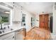 Charming kitchen with stainless steel appliances and hardwood floors at 200 Cleveland Ave, Shelby, NC 28150
