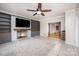 Spacious living room with a fireplace and built-in shelving at 200 Cleveland Ave, Shelby, NC 28150