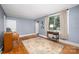 Bright living room showcasing hardwood floors and a large window at 200 Cleveland Ave, Shelby, NC 28150