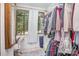 Walk-in closet features built in shelving, a small desk and great natural light at 200 Cleveland Ave, Shelby, NC 28150
