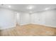 Bedroom featuring hardwood floors, a large closet, and an attached bathroom at 2011 Cedar Falls Dr # 71, Waxhaw, NC 28173