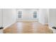 Bedroom featuring hardwood floors, white trim, and lots of natural light at 2011 Cedar Falls Dr # 71, Waxhaw, NC 28173