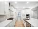 Sleek kitchen featuring a kitchen island, modern appliances, and white subway tile backsplash at 2011 Cedar Falls Dr # 71, Waxhaw, NC 28173