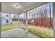 Covered patio offering outdoor relaxation space with views of a wooded area at 2011 Cedar Falls Dr # 71, Waxhaw, NC 28173