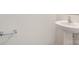 Bathroom features a sink with a chrome faucet, and a towel rack at 2021 Boynton St, Charlotte, NC 28269