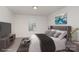 Cozy bedroom with a bed, sleek TV, and stylish decor for restful nights and entertainment at 2021 Boynton St, Charlotte, NC 28269