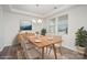 Bright dining room with a modern light fixture and natural light at 2021 Boynton St, Charlotte, NC 28269