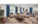 Cozy staged living room with stylish furniture, decor, and hardwood floors at 2021 Boynton St, Charlotte, NC 28269