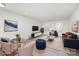 Bright living room with modern furnishings, plush seating, and large windows at 2021 Boynton St, Charlotte, NC 28269