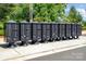 Row of community mailboxes, well-maintained and easily accessible, in front of some trees at 2021 Boynton St, Charlotte, NC 28269