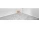 Neutral bedroom with plush carpeting, white walls, and white trim with a view to the hallway at 220 S Columbia St, Gastonia, NC 28054