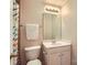 Standard bathroom featuring a single vanity, a toilet, and a shower with a patterned curtain at 2215 Maycroft Dr, Charlotte, NC 28262