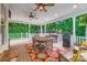Enjoy the outdoors on this covered deck, complete with dining and grilling areas at 2215 Maycroft Dr, Charlotte, NC 28262